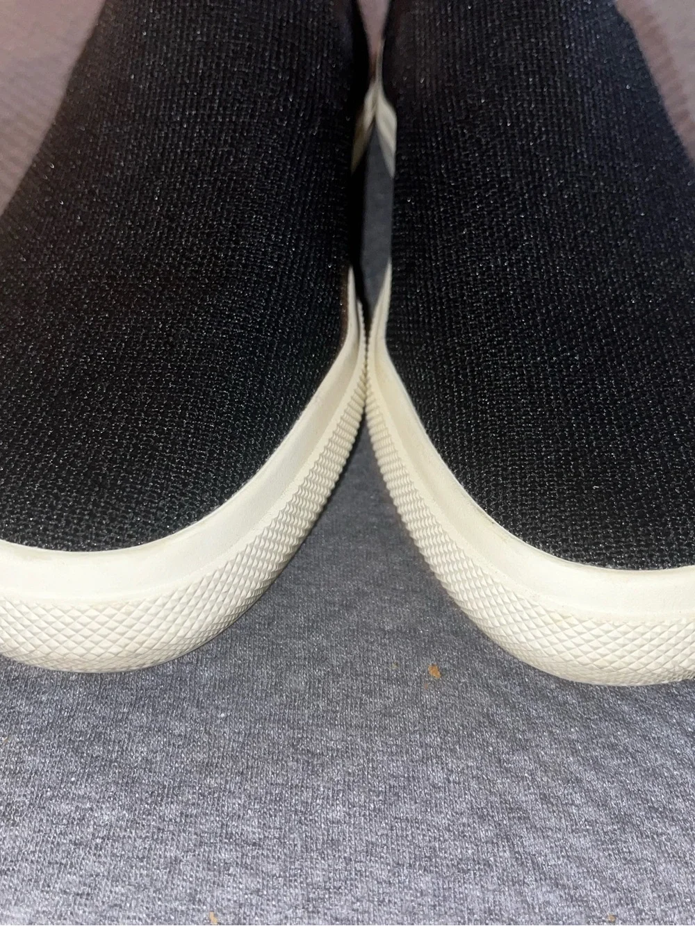EUC Rothy's The Original Slip-On Sneakers in black. Size 9